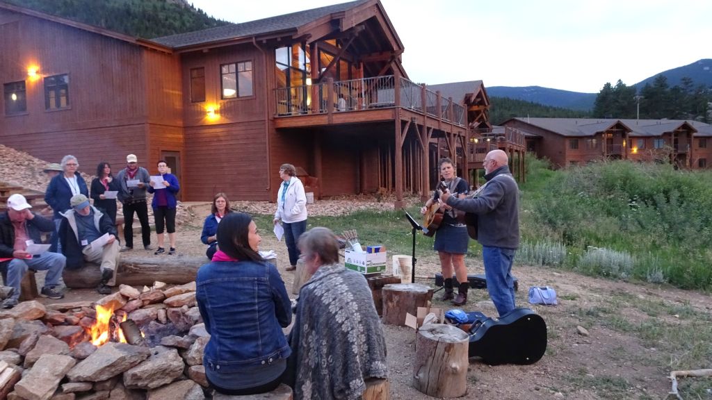 Peggy Marshall & Kent Meyer leading campfire sing along