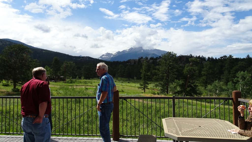 Jim Hofman & doug West on the deck looking at Mt. Meeker