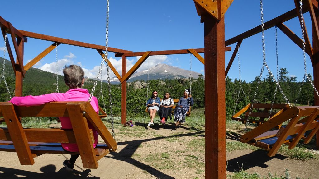 Looking at Mt Meeker while enjoying the swing